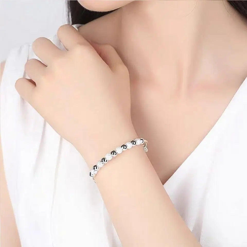 Silver Glow Beaded Bangle